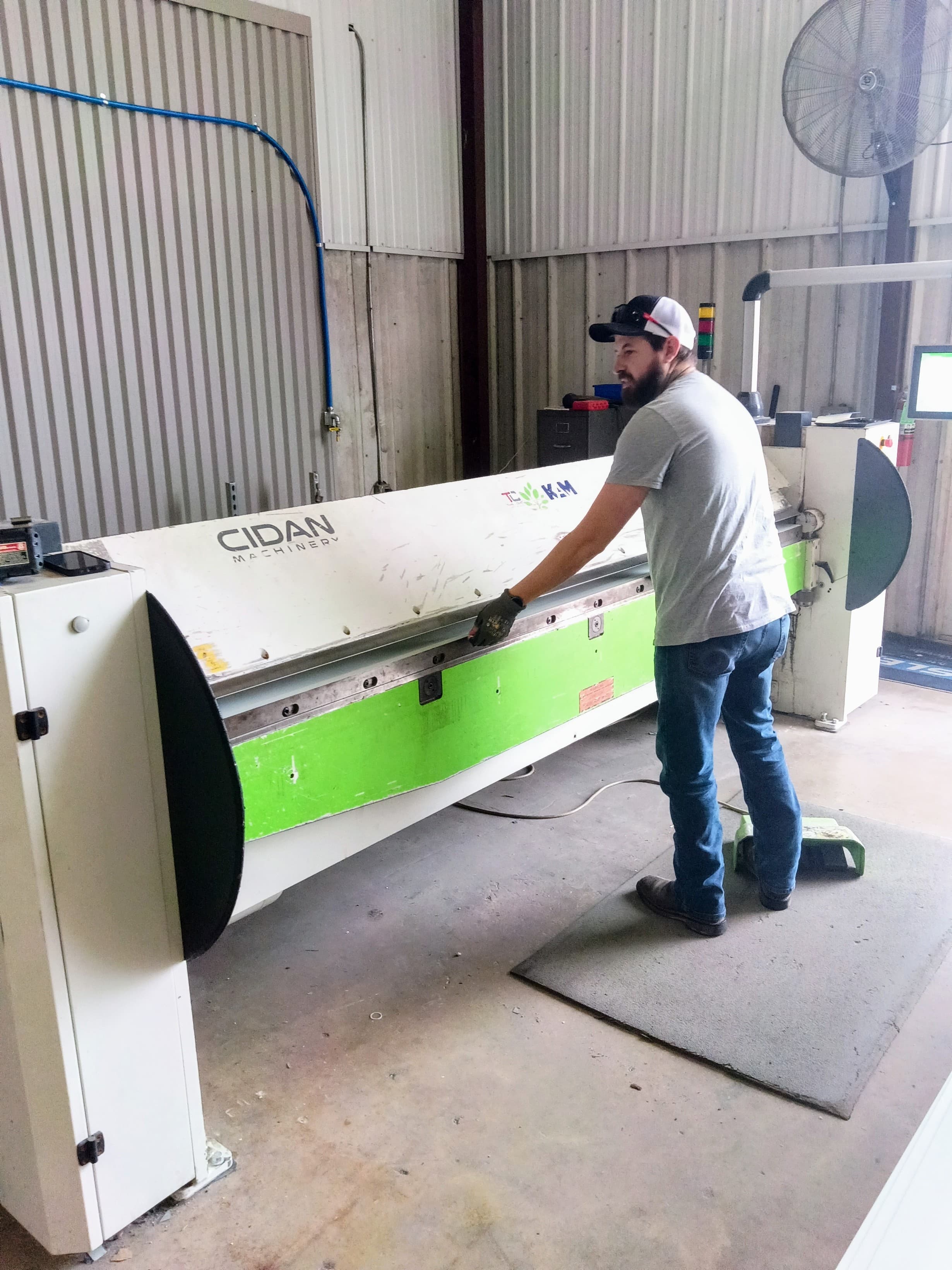 Architectural sheet metal being formed in the Kansas Architectural Metals fabrication shop