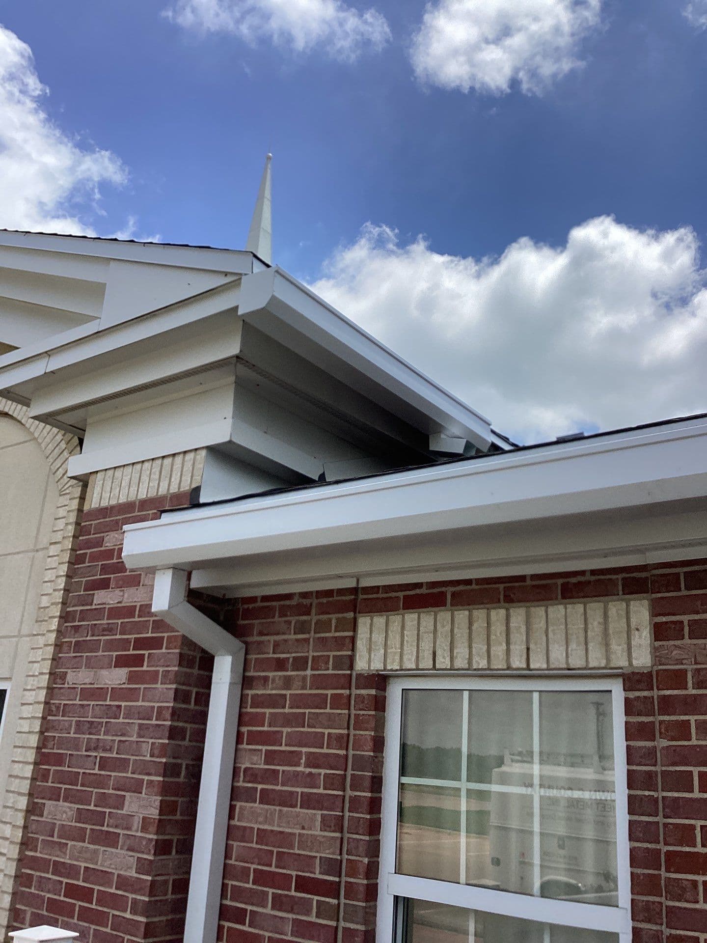 Installed 7-inch D-style seamless box gutter and downspout